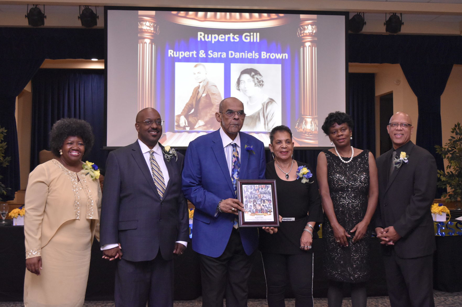Franchot Brown, Esquire and sister Norma Wileeta Brown-Pope accepts Legacy Award for Rupert's Grill.